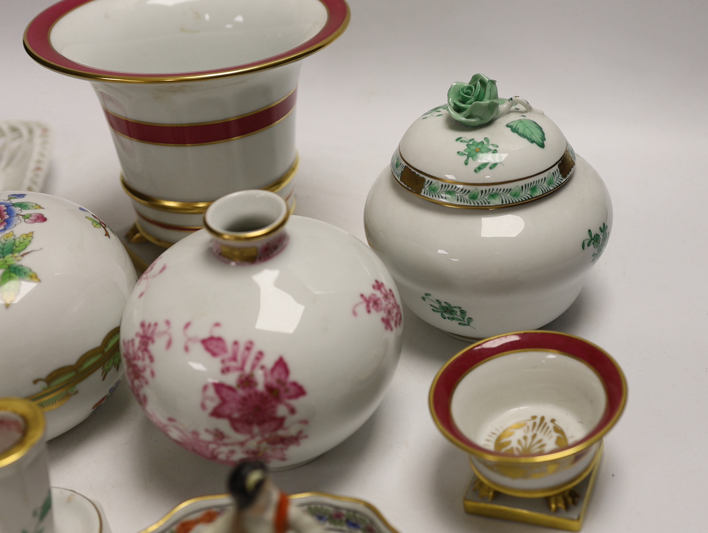A group of Herend, Hungary porcelain wares including; a covered dish, tray, candlestick, two pedestal vases, boy on a goose, etc. tallest 13cm